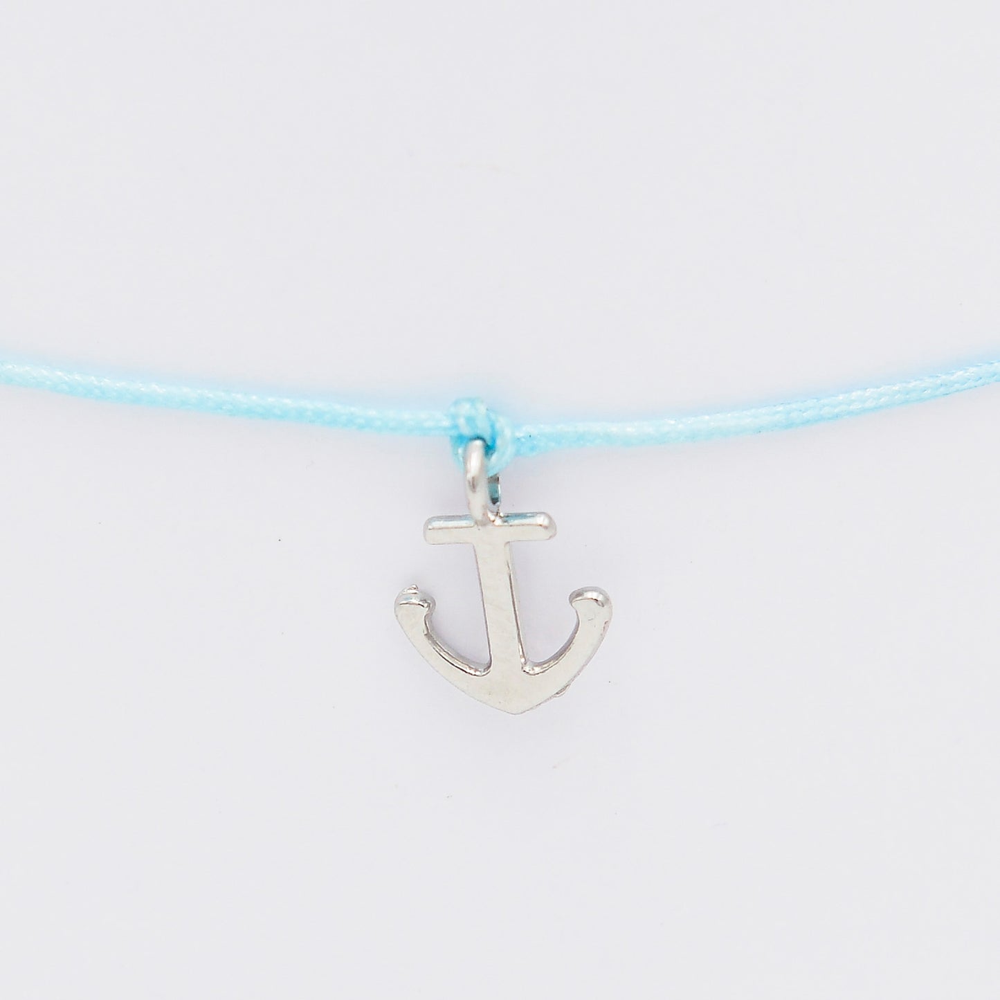 Armband mit Anker in Silber und hellblauen Armband