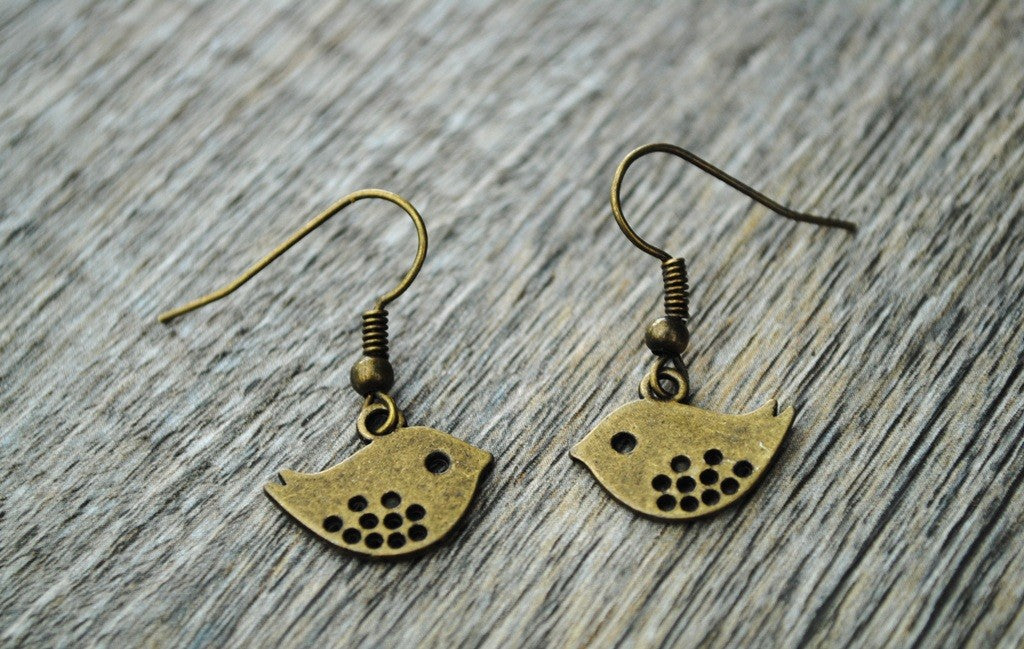 Ohrringe mit Minivogel in bronze